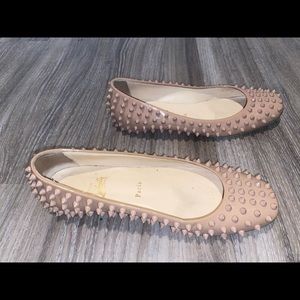 Spiked Christian Louboutin flats